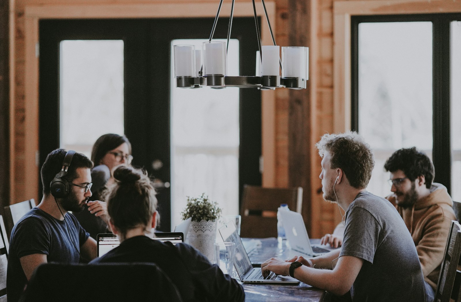 Support team collaborating at a workstation